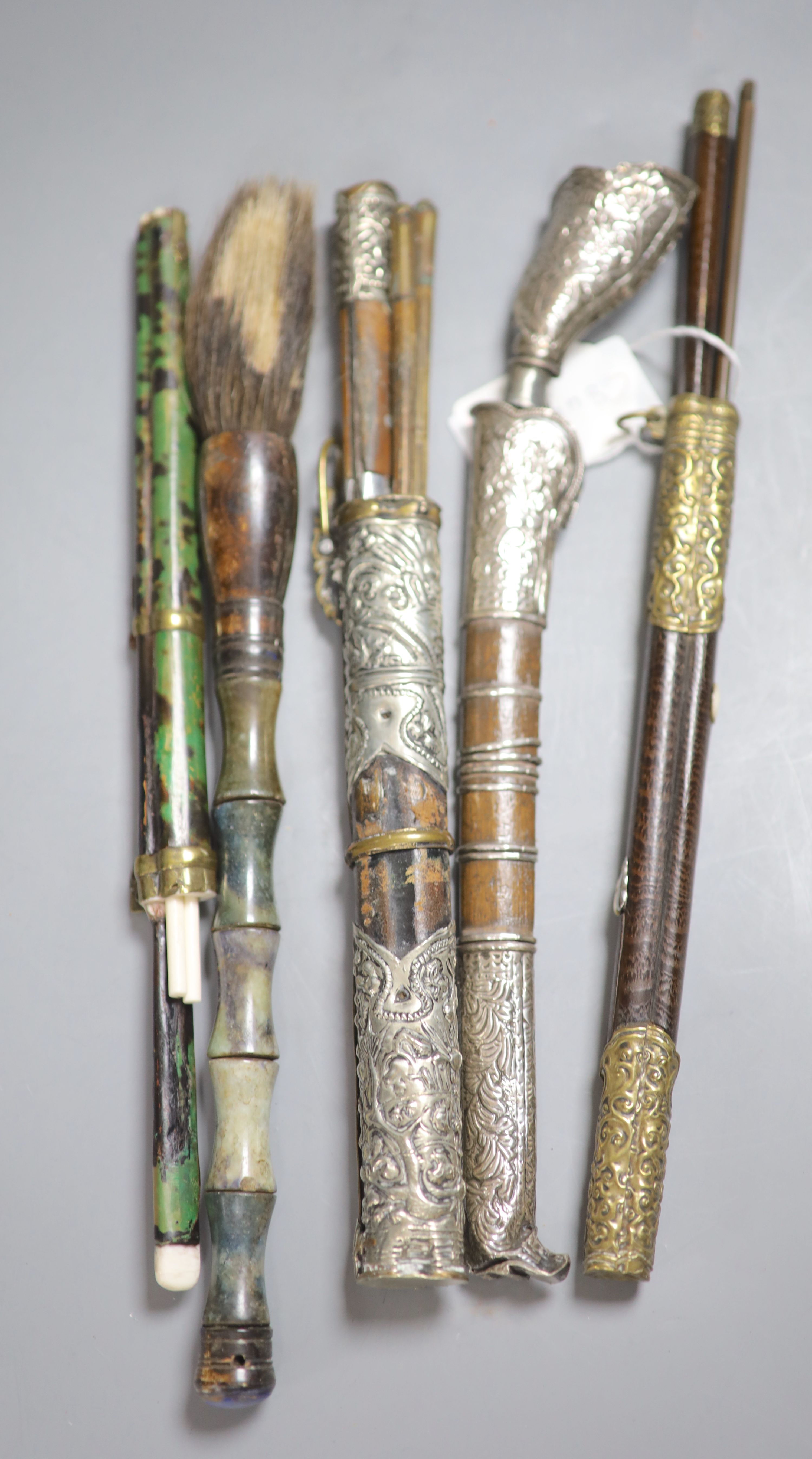 Three South East Asian chop stick sets and knife holders, c.19th and 20th century, a dagger etc